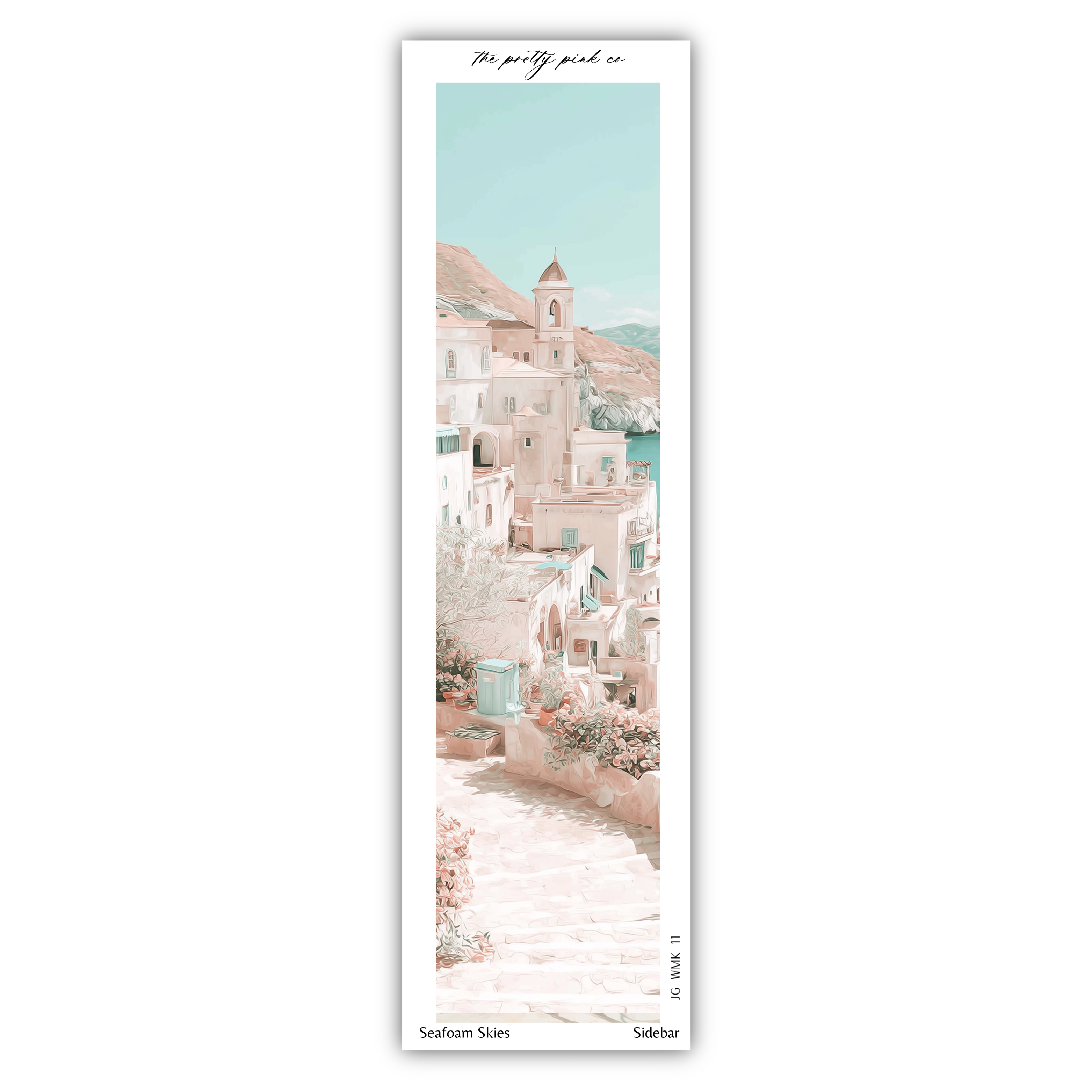 A vertical image of a picturesque coastal town with white buildings, a church tower, and a path leading down to the water.