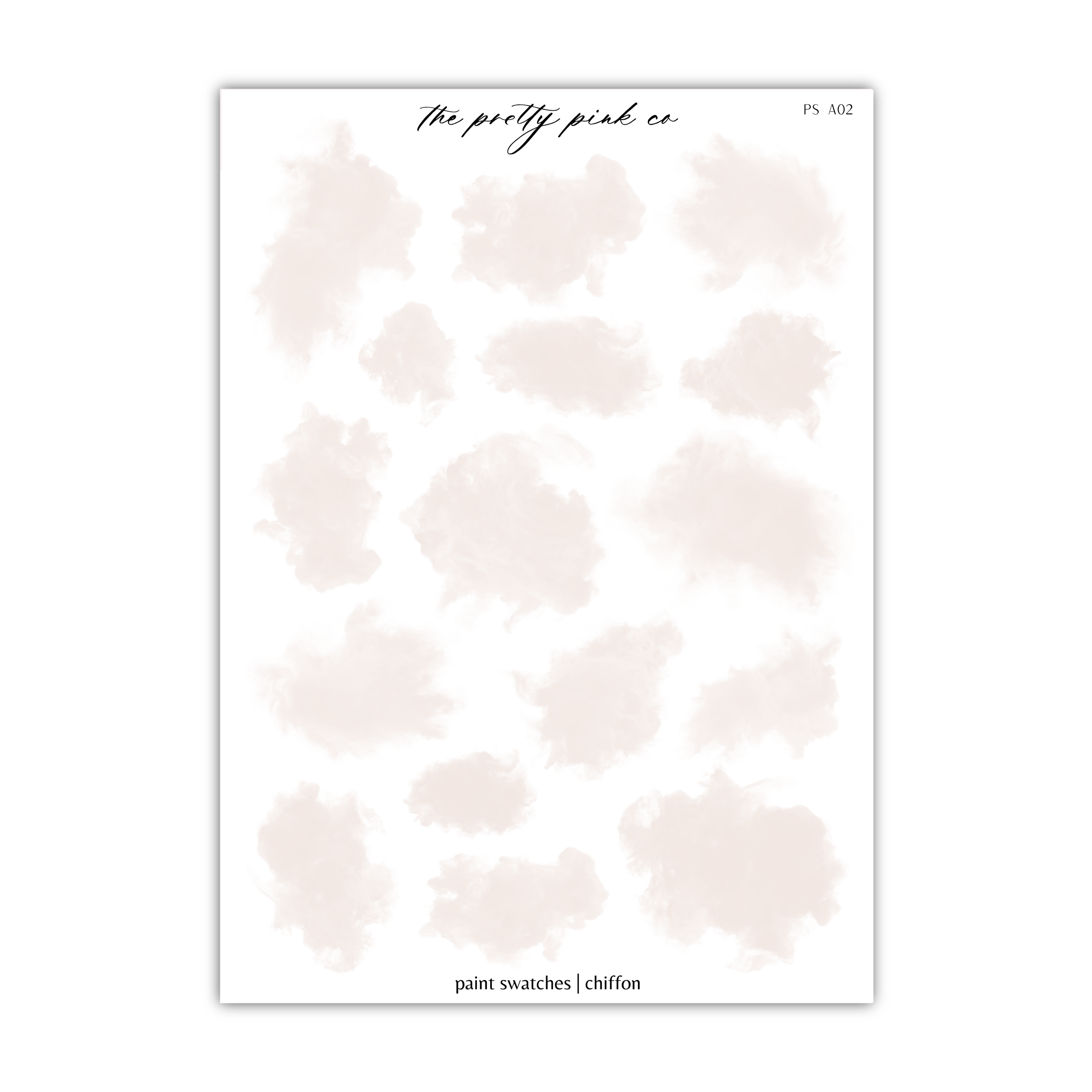 a sheet of paper with watercolor clouds on it