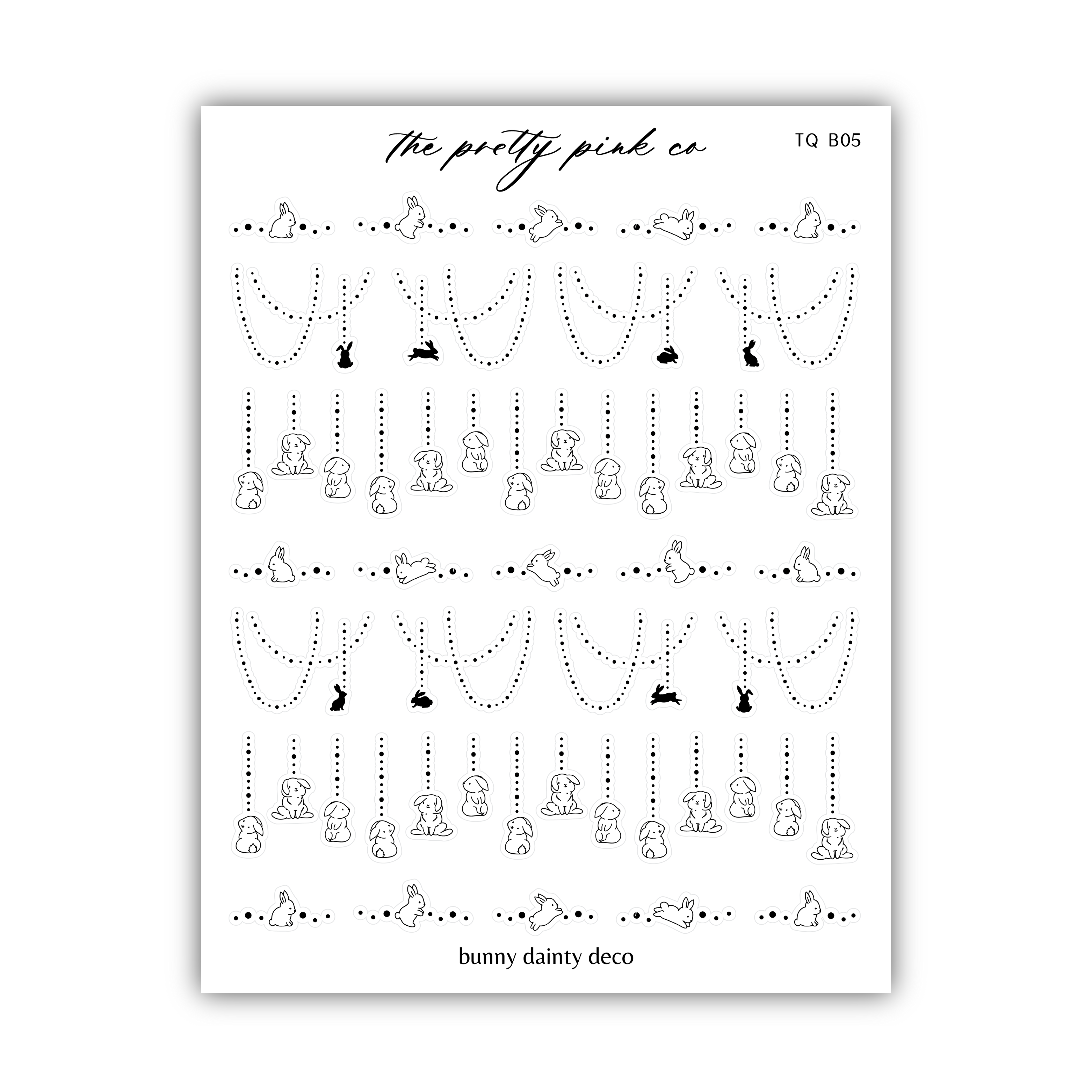a sheet of paper with a pattern of cats and birds on it