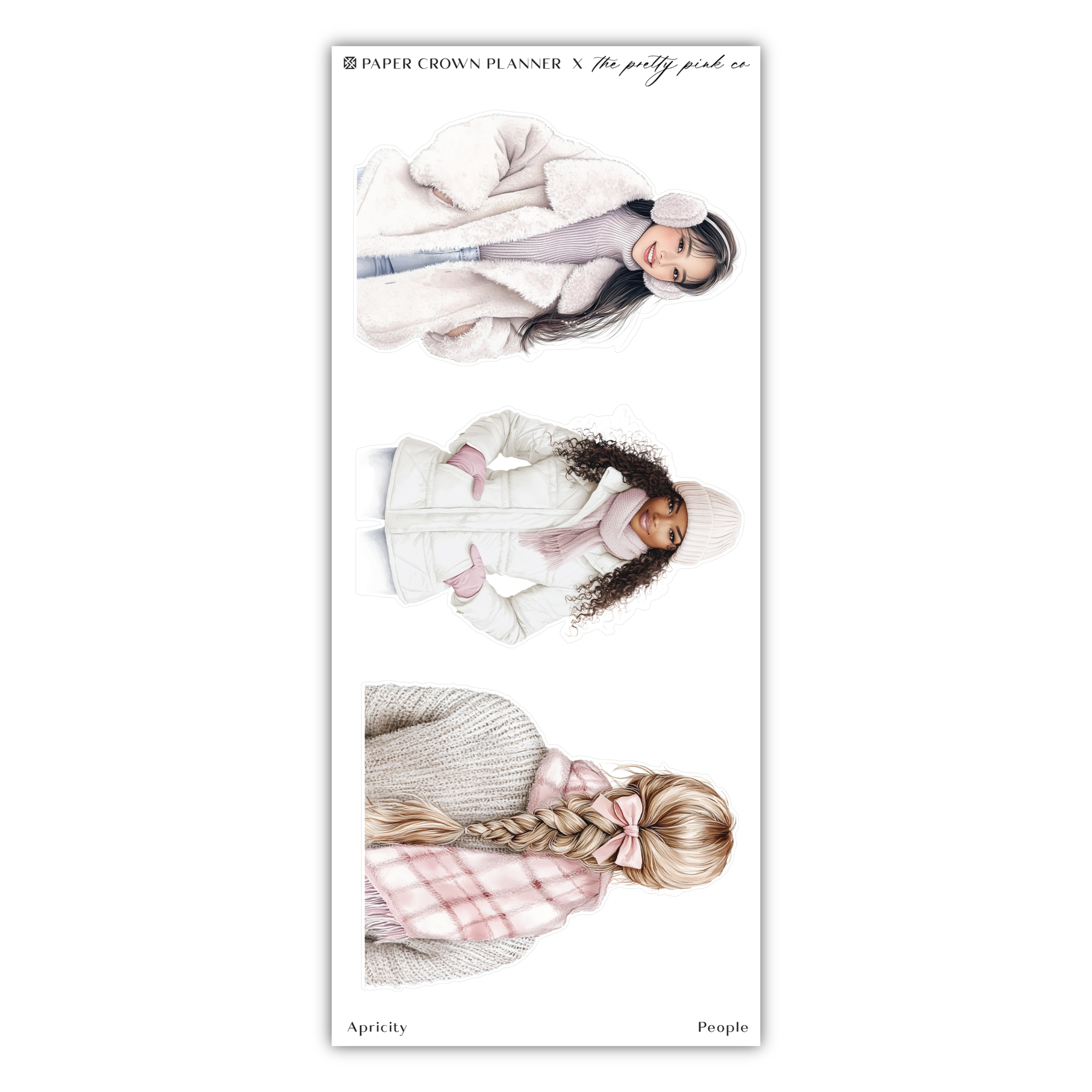 a bookmark with two girls wearing sweaters