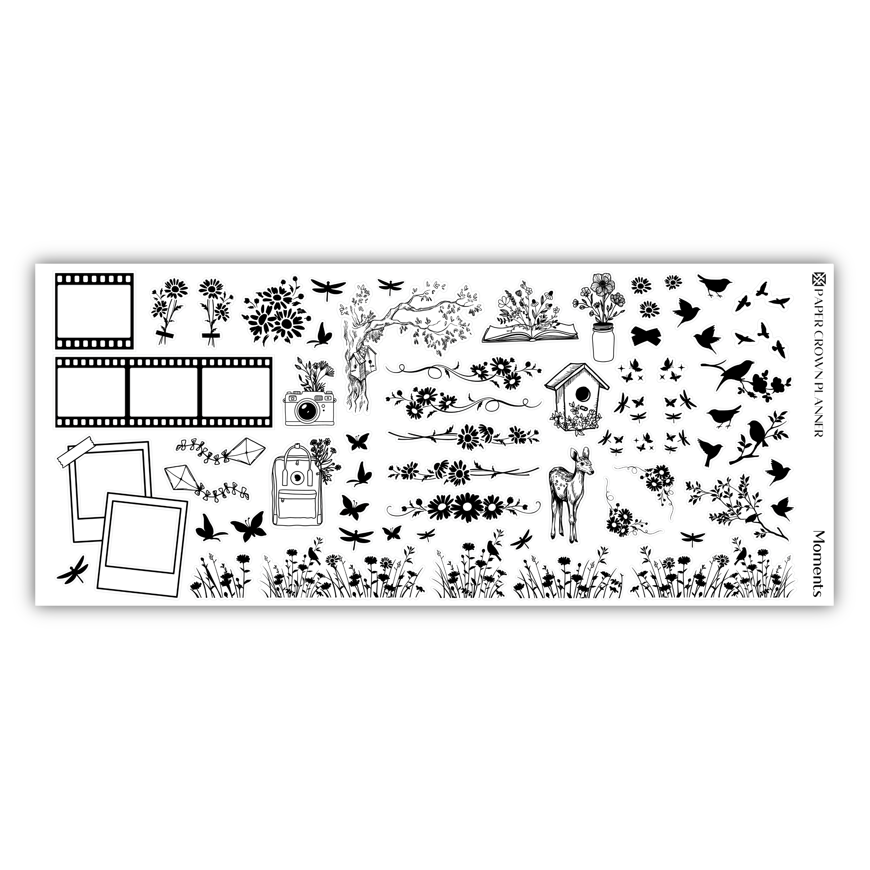 a black and white photo of a sheet of stickers