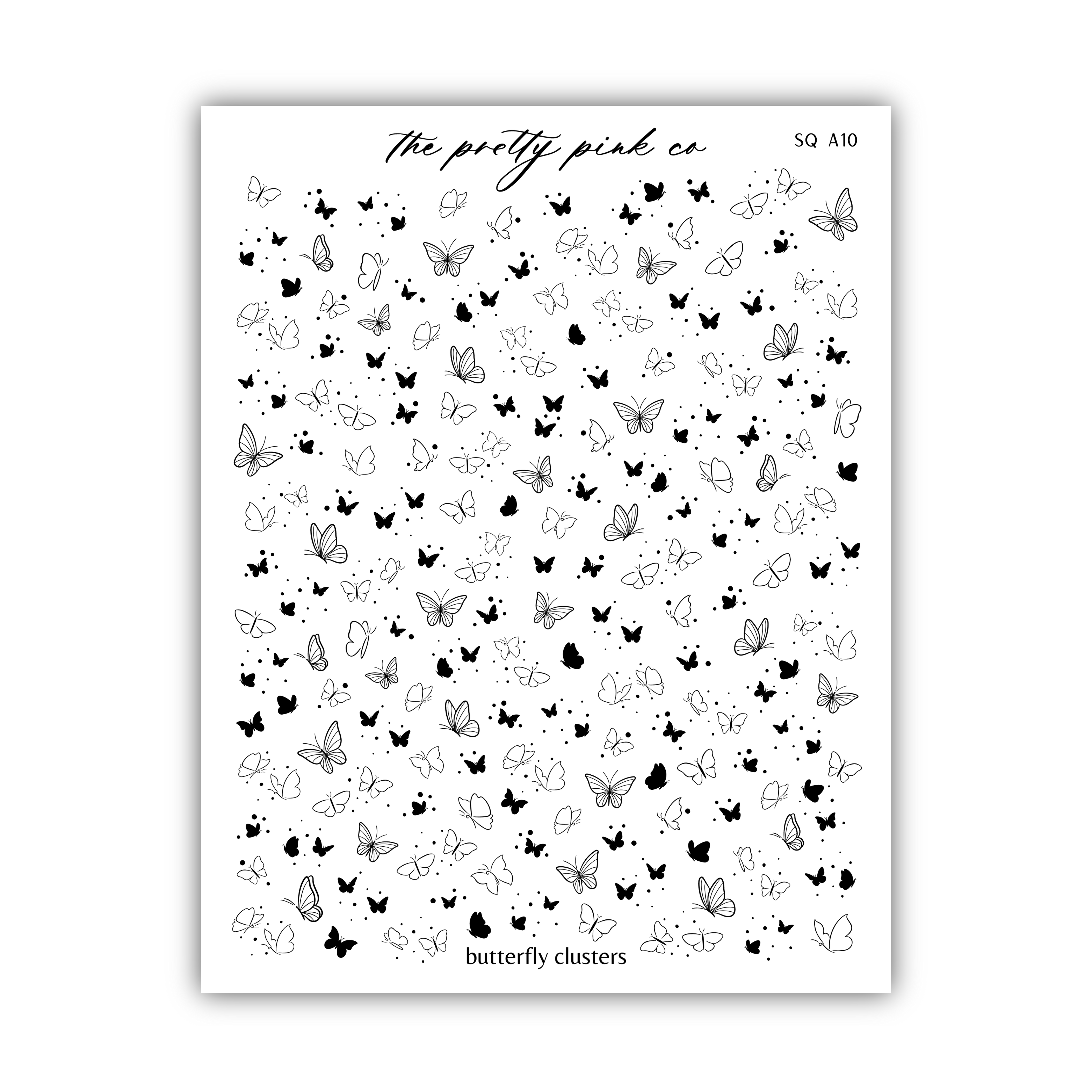 a sheet of black and white butterflies on a white background